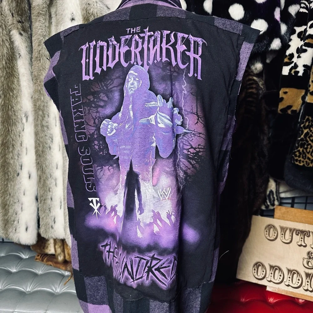 “The Undertaker” huge patch on a Rothco plaid sleeveless shirt